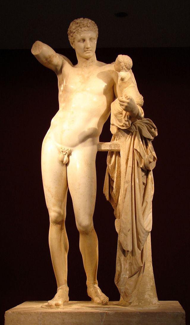 Hermes carregando o infante Dionísio, de Praxíteles, uma das mais famosas estátuas do deus. Século IV a.C., provavelmente cópia romana. Museu Arqueológico de Olímpia